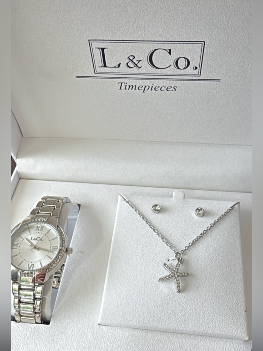 L & Co Timepieces 3-Piece Silver
Watch, Starfish Necklace & Stud
Earrings NWT